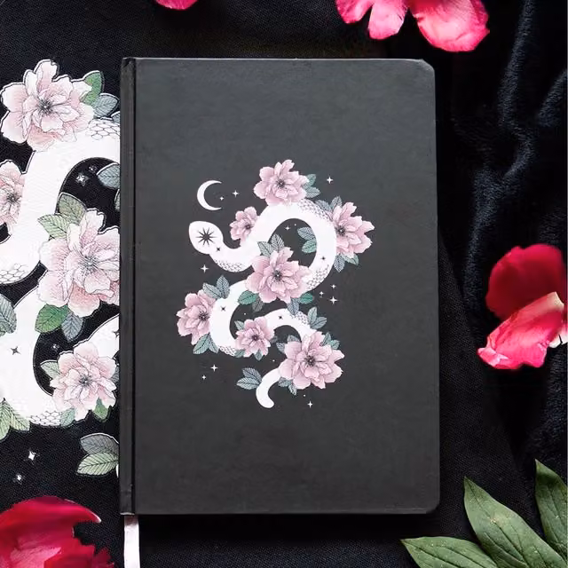 Kingsbury Gifts Floral Snake Hardcover A5 Lined Notebook with Bookmark in White, Pink and Black