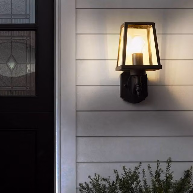 Wyld and Coco Matte Black Metal Outdoor Wall Lantern with Transparent Glass Shade