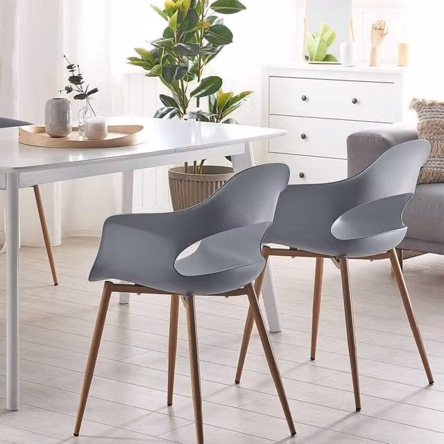 Wyld and Coco Set of 2 Modern Grey Synthetic Dining Chairs with Armrests and Metal Legs – 1