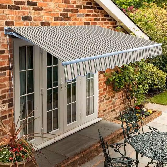 Primrose Manual Retractable Wall-Mounted Awning with Folding Arms, Multicolour Striped, W: 350 cm, D: 250 cm