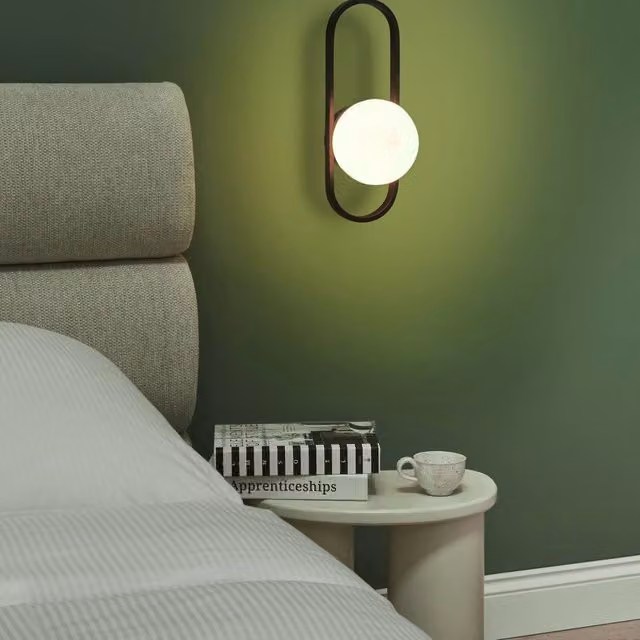 Wyld and Coco Modern Oval Wall Lamp in Black Metal with White Glass Globe