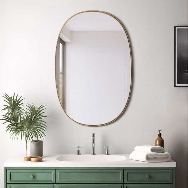 Komore Modern Oval Metal Framed Wall Mirror in Gold or Silver