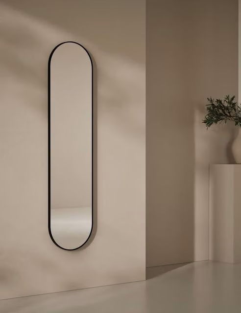 M&S Milan Modern Pill Shaped Wall Mirror in Black