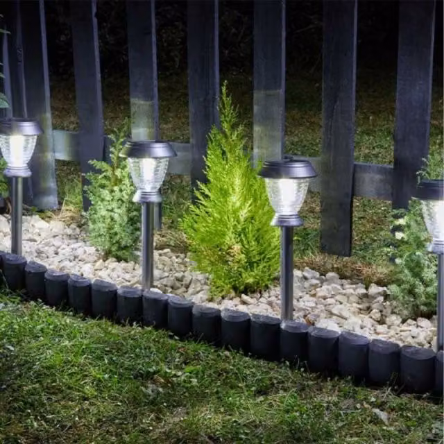 Pack of 4 Smart Solar Triton Stake Lights in Silver with Dusk Sensor and Ground Spike