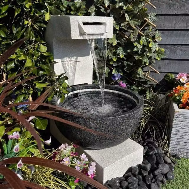 Tranquility Solo Pour Contemporary Round Solar Water Feature in Grey Antique Stone