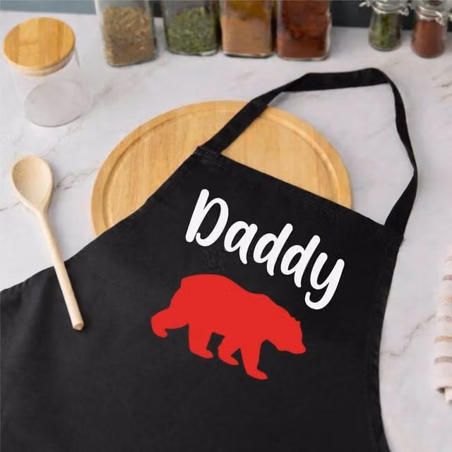 60 SECOND MAKEOVER Men's Daddy Bear Apron in Black