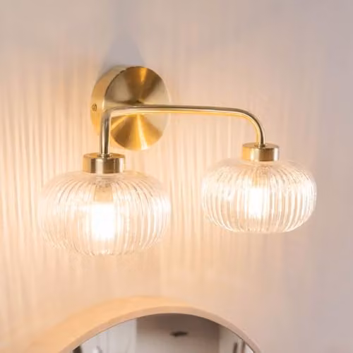 ValueLights Pair of Gold 2 Way Up and Down Wall Light Fittings with Transparent Ribbed Glass Lampshades and LED Bulbs Included, IP44 Rated – 2