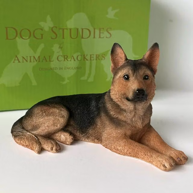 Animal Crackers Realistic Laying German Shepherd Dog Figurine in Black, Brown and Green, Height: 18 cm – 1