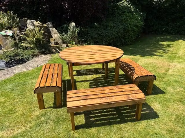 Charles Taylor Trading Knights Eight Seater Round Table Set in Brown