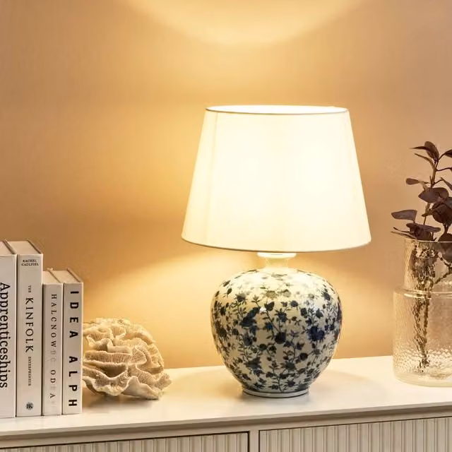 Wyld and Coco Porcelain Floral Table Lamp with White Ceramic Base and Blue Flower Detail – 1