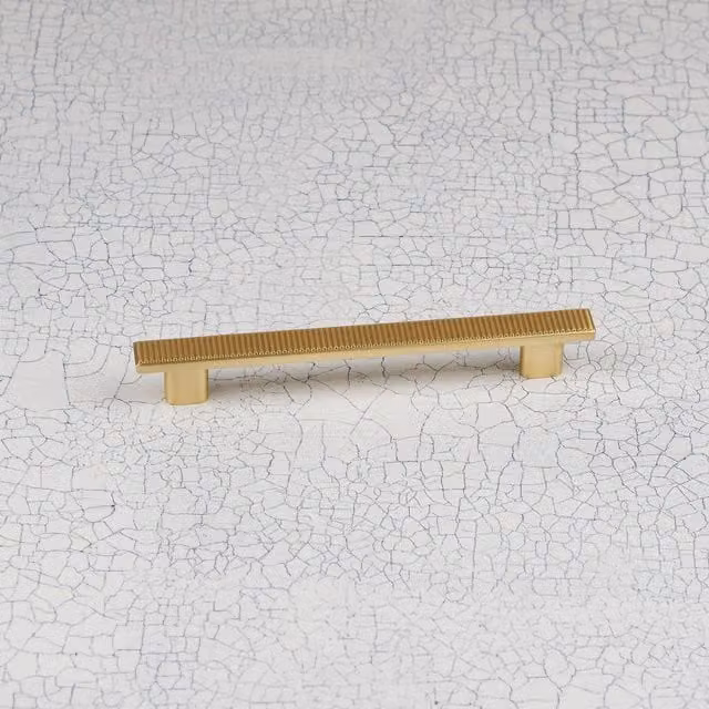 Handle & Home Ribbed Detailing Bar Handle and Coordinating Knobs in Brushed Brass Gold Zinc