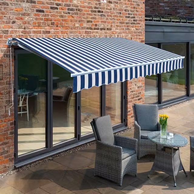 Primrose Manual Retractable Wall-Mounted Awning with Blue and White Striped Fabric and White Aluminium Frame, W: 400 cm, D: 300 cm