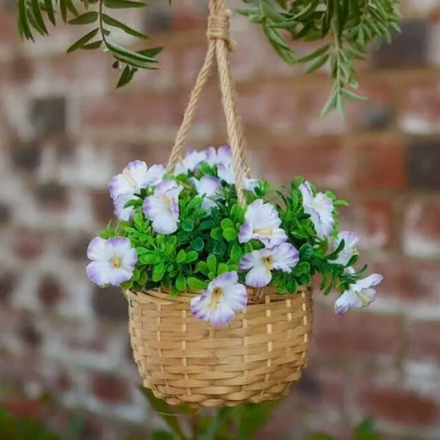 Garden Mile Hanging Round Rattan Basket with Mixed Artificial Floral Blossoms in Brown, Purple and Green