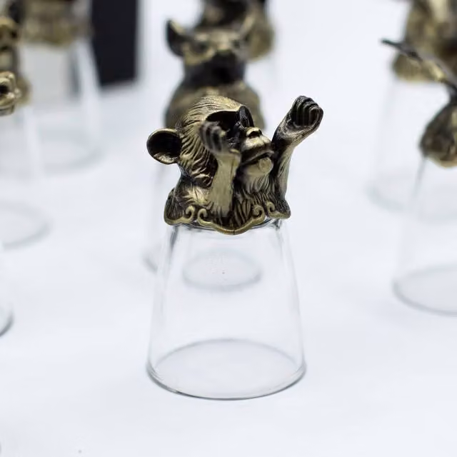 Serenityy 12-Piece Chinese Zodiac Shot Glass Set, 25ml, Clear with Antique Metal Base
