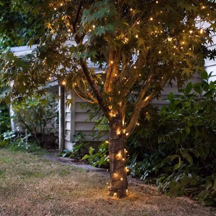 Lights4fun 200 Warm White LED Outdoor Battery Fairy Lights on Green Cable with Timer