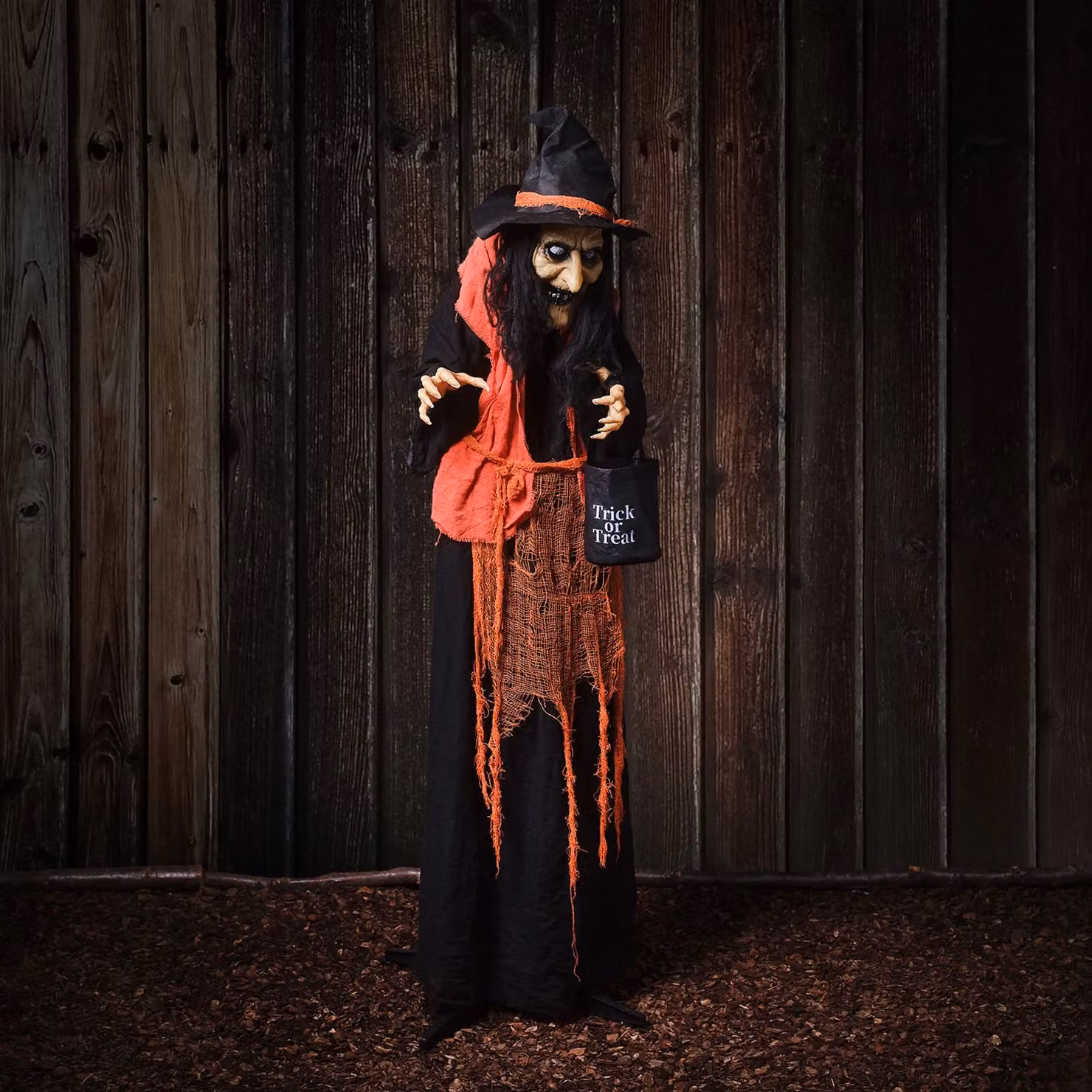 Lights4Fun Animated Witch Halloween Decoration with Candy Bag, Pumpkin Coloured Robe and Flashing Red LED Eyes, Height: 160 cm – 1