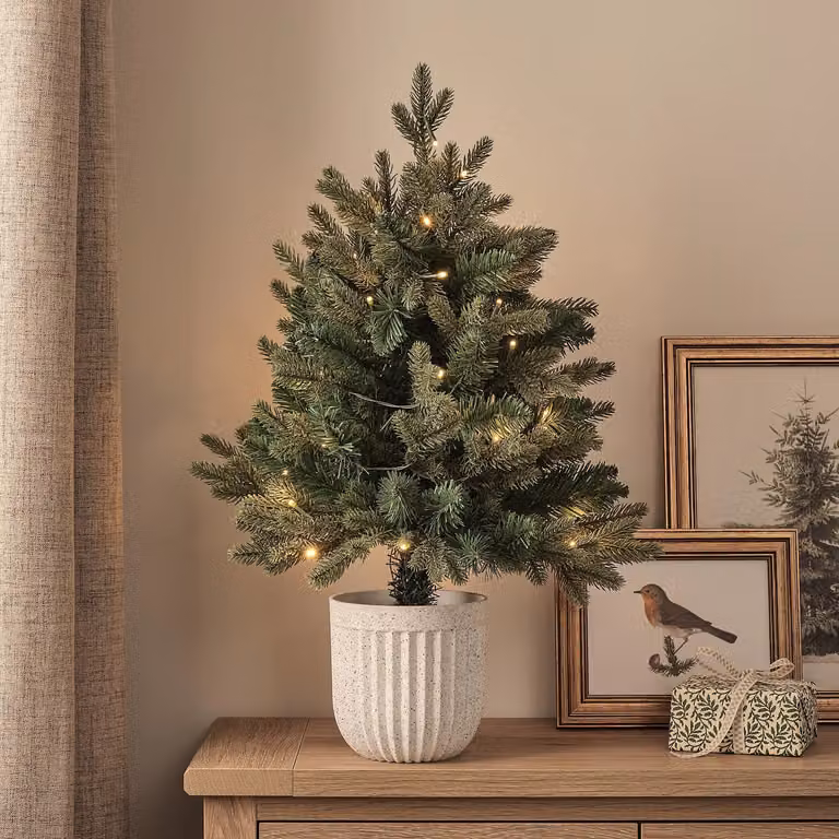 Lights4fun.co.uk 60 cm Pre-Lit Green Outdoor Christmas Tree with Warm White Lights and White Pot