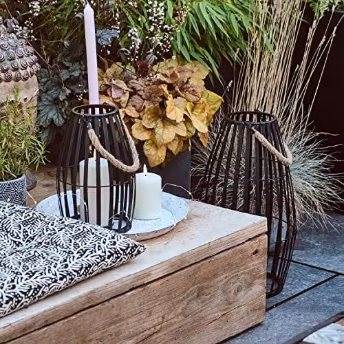 Lights4fun Set of 2 Black Metal Cage Waterproof Outdoor LED TruGlow Pillar Candle Lanterns with Timer and Flicker Effect – 4