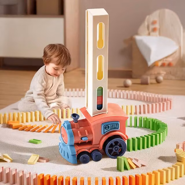 Komore Automatic Domino Laying Train Toy with Lights in Pink