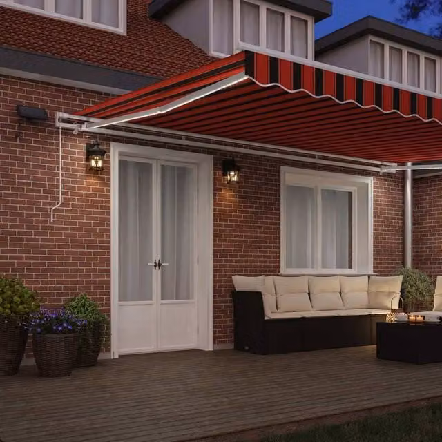 Berkfield Home Manual Retractable Wall-Mounted Awning with LED, Orange and Brown Striped Polyester, W: 500 cm, D: 300 cm – 1