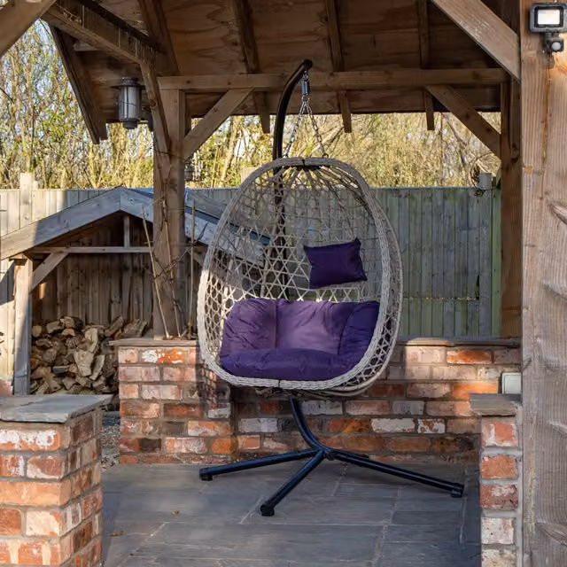 Samuel Alexander Hanging Garden Rattan Egg Chair with Steel Frame and Waterproof Cover in Blue