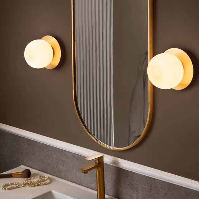 Wyld and Coco Set of 2 Gold and Brass Wall Lamps with Transparent Glass Spheres