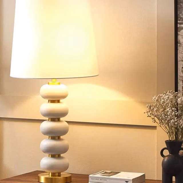 Wyld and Coco Table Lamp with Gold Oval Base and White Fabric Shade