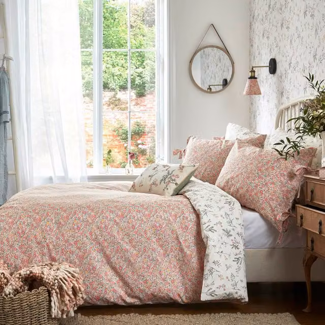 Laura Ashley Loveston Reversible Floral Cotton Duvet Cover and Pillowcase Set in Coral Pink