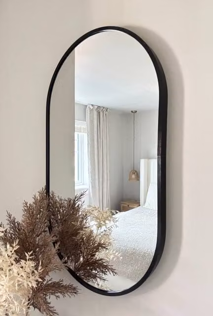 Downton Interiors Modern Oval Metal Frame Wall Mirror in Black and Gold, 70 cm – 1