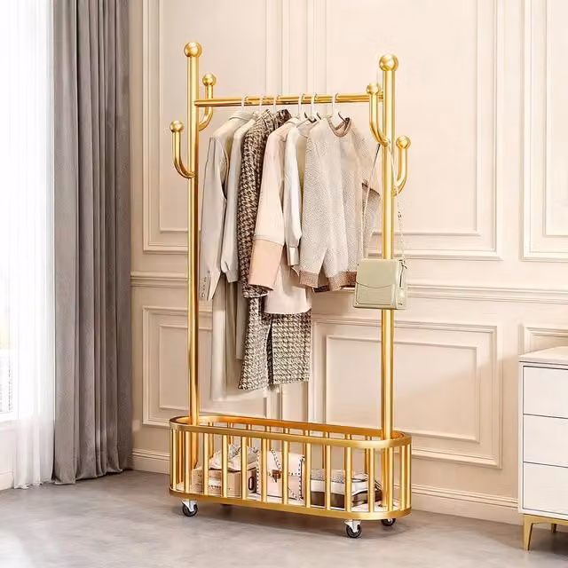 London Boutique Metal Rolling Clothes Rack with Shelf and Hooks in Gold