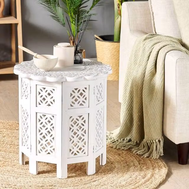 Wyld and Coco Co Carved Mango Wood Round Side Table in Distressed Off-White