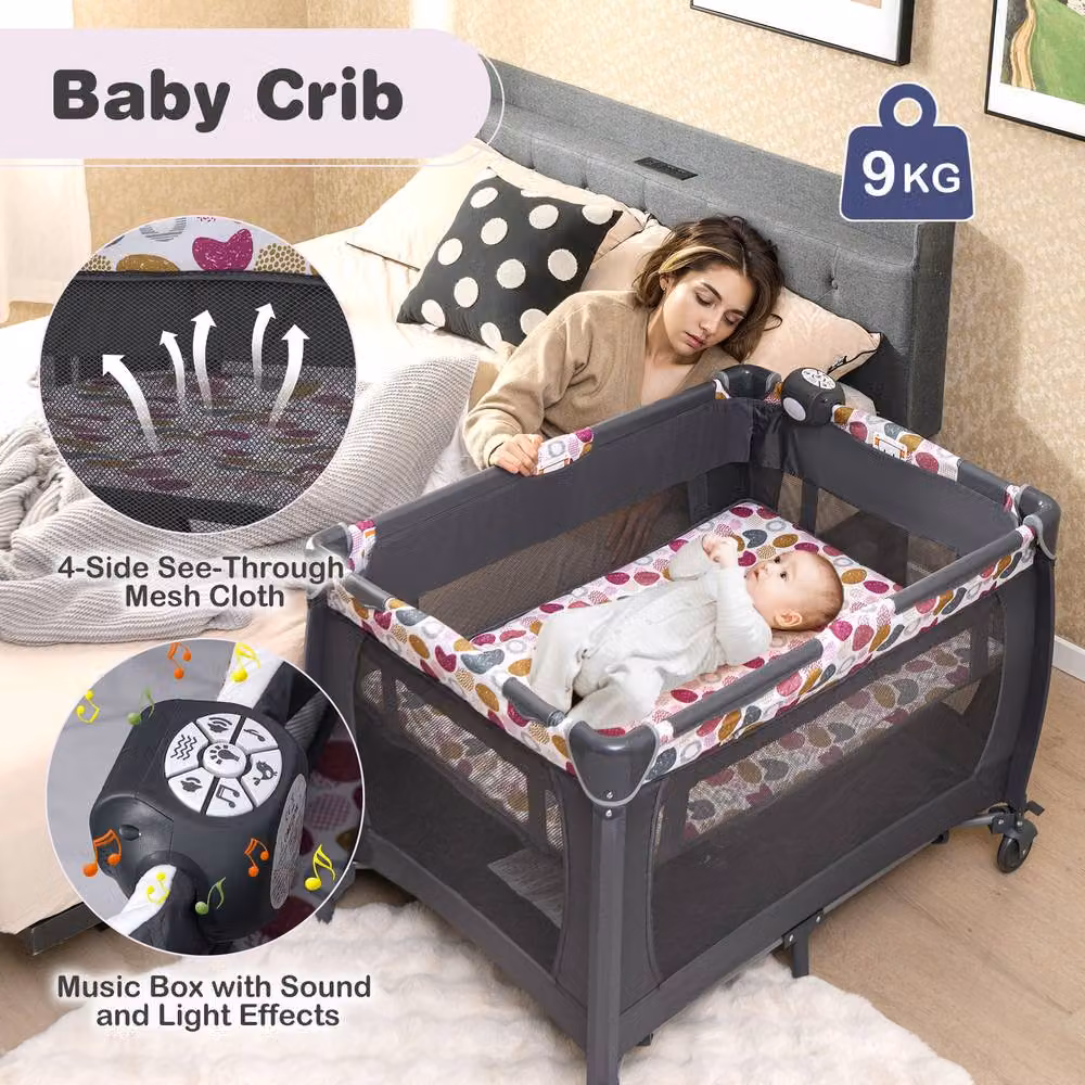 Costway Foldable Pack and Play Portable Baby Playard with Rocking Bassinet and Music Box in Pink – 7