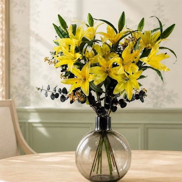 Botanik 100cm Artificial Yellow Lily and Black Eucalyptus Flower Arrangement in a Round Glass Ball Vase