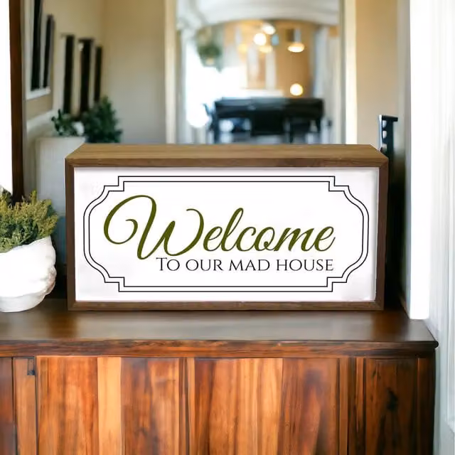 Echo Three LED Welcome To Our Mad House Light Box in Brown Wood