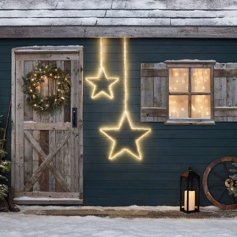 Lights4fun Set of 2 Outdoor Hanging Star Lights with 310 Warm White LEDs and Cluster Effect, White