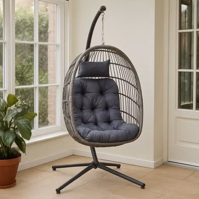 Samuel Alexander Grey Rattan Hanging Egg Chair with Metal Stand and Cushions for Indoor Use