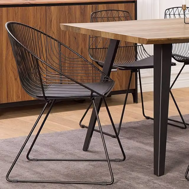 Wyld and Coco Set of 2 Industrial Dining Chairs with Black Metal Cantilever Frames and Faux Leather Cushions – 1