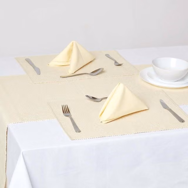 Homescapes Pack of 2 Plain Cotton Placemats in Beige and Yellow