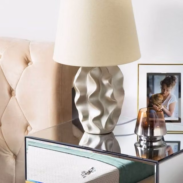 Wyld and Coco Ceramic Bedside Table Lamp with Beige Fabric Shade in Gold and Brass – 1