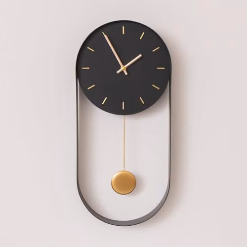 Melody Maison Black and Gold Pendulum Metal Analogue Oval Wall Clock, W: 20 cm, H: 55 cm