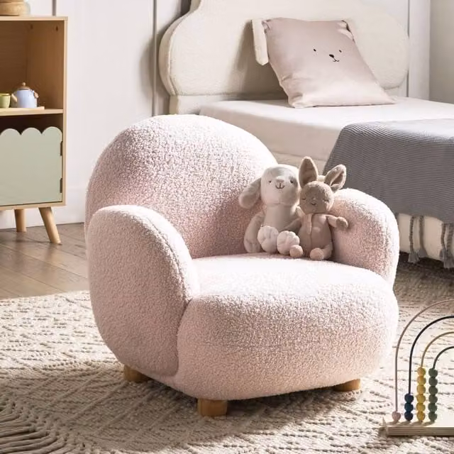Wyld and Coco Kids Armchair in Pastel Pink Boucle with Rubberwood Legs