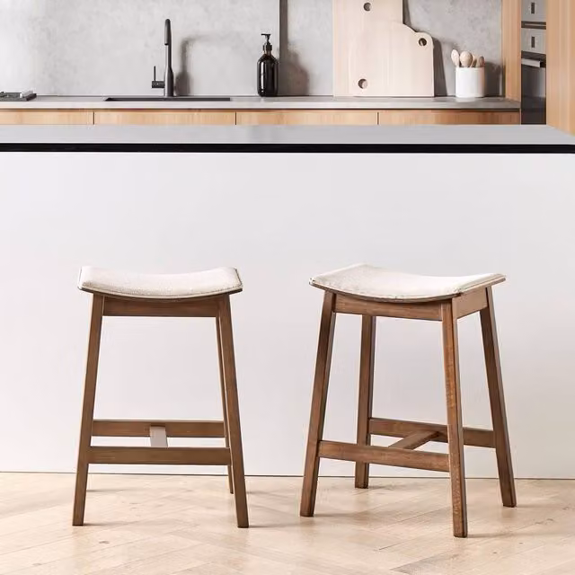 Wyld and Coco Set of 2 Backless Bar Chairs with Beige Polyester Upholstery and Dark Brown Rubberwood Frames