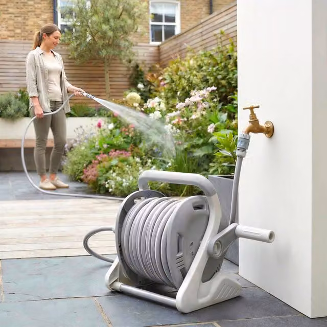 KORVIXA Grey Wall-Mounted Metal Portable Garden Hose Reel with 2-Pattern Spray Nozzle – 1