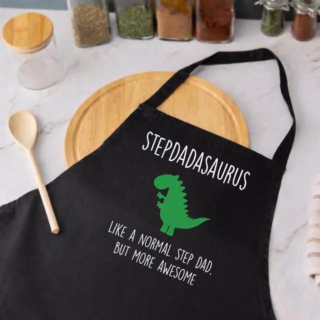 60 Second Makeover Stepdadasaurus Men's Cotton Apron in Black