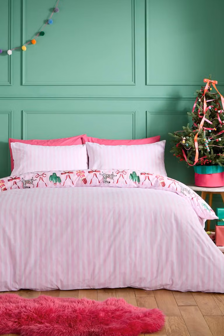 Catherine Lansfield Christmas Kitsch Reversible Duvet Cover and Pillowcase Set, Pink, W/D/H: 135 x 200 cm and 50 x 75 cm