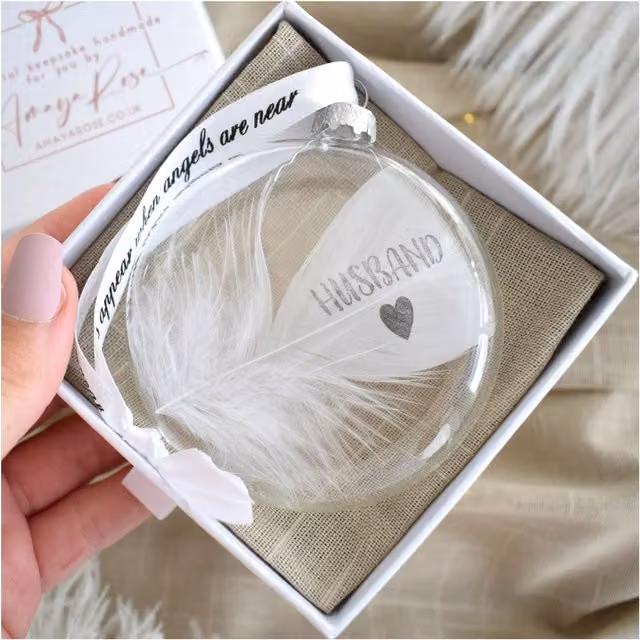 Amaya Rose Ltd In Memory of Husband Round Glass Feather Bauble in Clear and White
