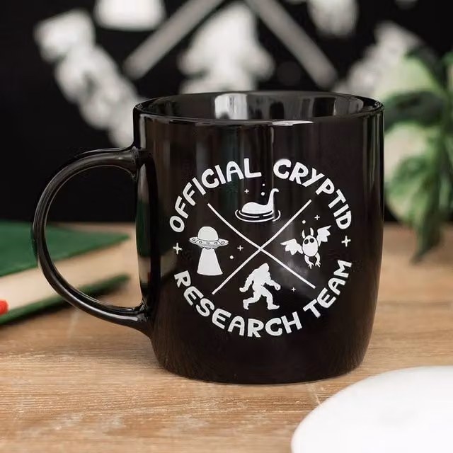Uniqueful Cryptid Research Team Ceramic Mug in Black, 350 ml