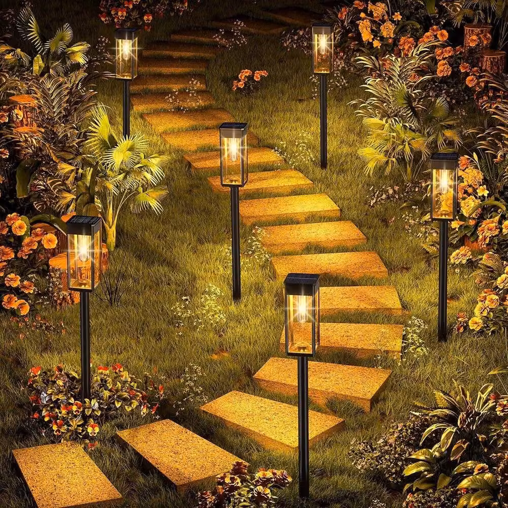 KORVIXA 2-Piece Set of Black Solar LED Garden Lights with Warm White Candle Effect – 4