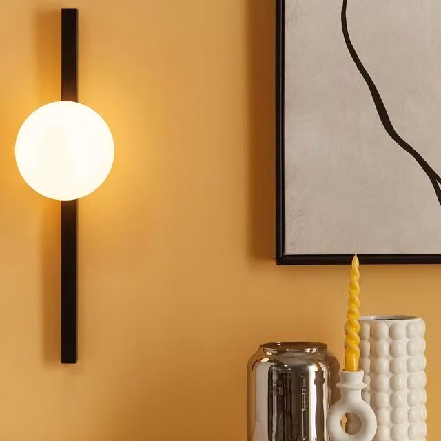 Wyld and Coco Modern Black Metal Wall Lamp with White Glass Sphere, Height: 55 cm – 1