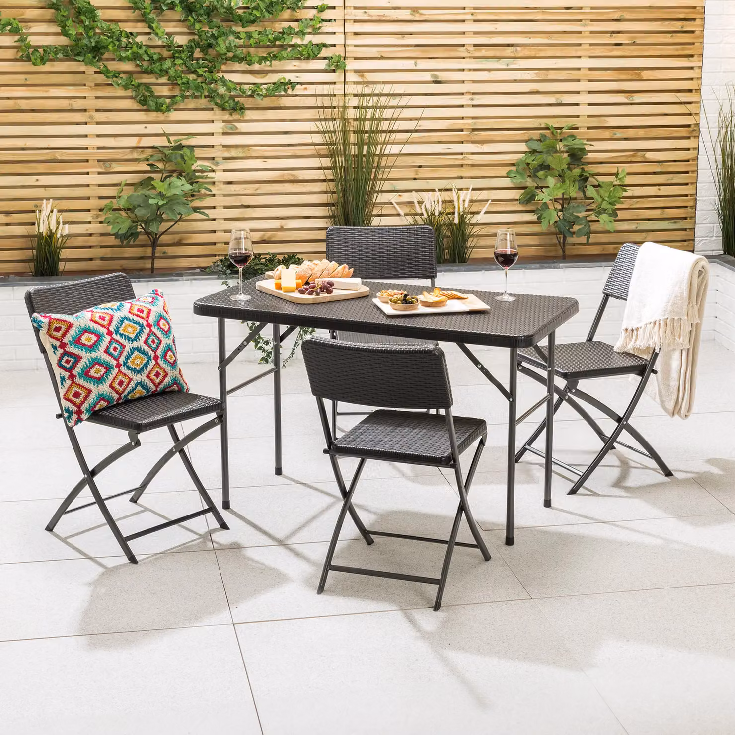 Christow 4 Seater Rattan Effect Garden Dining Set with Rectangular Table and Chairs in Black – 2